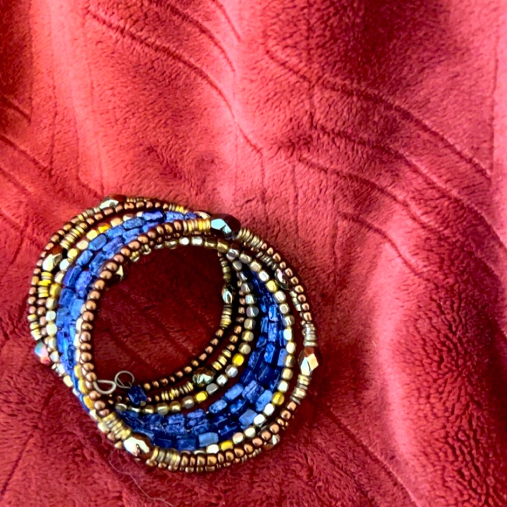 Blue and gold Maurice’s bracelet.